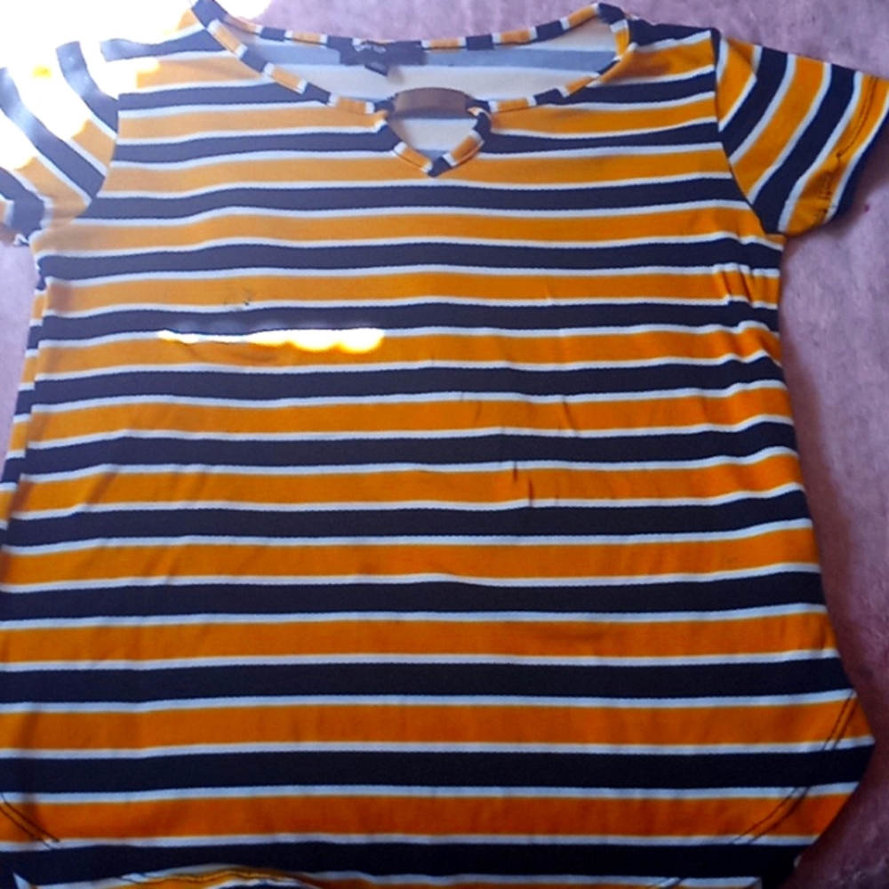 From Rainbow a size 10-12 in girls the color is yellow black and white